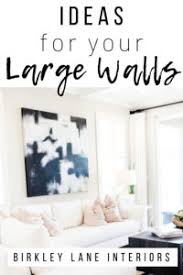 If your large wall happens to fall between two perpendicular side walls, you might find that the best way to decorate the large wall is to get some use out of it. 12 Affordable Ideas For Large Wall Decor Birkley Lane Interiors