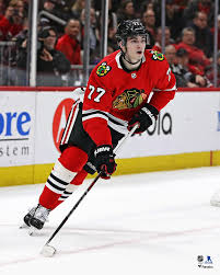 Kirby Dach Chicago Blackhawks Unsigned Red Jersey Skating Photograph Walmart Com Walmart Com