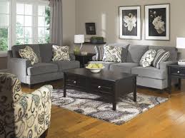 جودة الكنب الأمريكي وألوان الباستيل يجعل اختيار الإكسسوارات والديكور أكثر مرونة آ Ashley Furniture Living Room Living Room Sets Furniture Living Room Grey