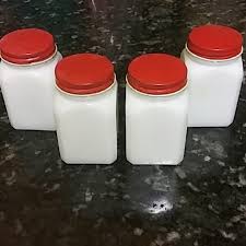 The early jars were molded with the designs on, while later jars was made plain and then paper labels were added later. Vintage Kitchen Vintage Milk Glass Spice Jars Poshmark