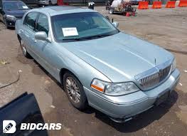 Image result for Light Ice Blue 2006 Town Car