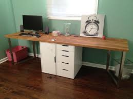 Fortunately the butcher block was already fairly close in color to the floors—it just needed a subtle while lucas worked on the desk leg, i began filling the counter seam with wood filler in natural, which seemed to be a close color match to the butcher block (you can also use leftover sawdust mixed with. Butcher Block Desk Top Diy Strangetowne Enjoy Doing Your Work In Butcher Block Desk