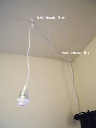 Girl Meets Apartment How To Easily Install A Hanging Light Renter Style