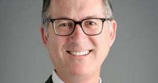 John Ryan, fierce defender of dual banking system, is dead at 58