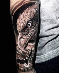 Top 50 Tattoos With Meanings Eagle Tattoo Eagle Tattoo Eagle Tattoo Men Arm Eagle Tattoos