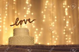 Cook, whisking, until the sugar dissolves, the egg whites become frothy and the mixture is. A Simple White Wedding Cake With The Word Love Written In Sparkling Stock Photo Picture And Royalty Free Image Image 21924501