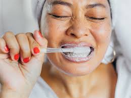 First face your bristles downward, brushing the topside of your braces and then flip the toothbrush to brush the underside of your braces. How To Brush Your Teeth With A Standard Or Electric Toothbrush
