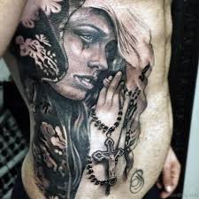 Cute rib cage tattoos featuring birds, flowers, and quotes, inked with fine. 47 Classic Rosary Tattoos For Rib