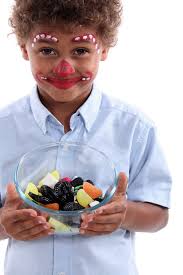 Little boy with candy stock image. Image of nose, glass
