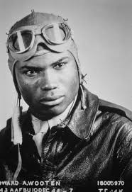 USAAF pilot Howard A. Wooten, a Tuskegee Airmen, wearing an aviator's cap  and goggles, possibly in a graduation portrait taken at the Army Flight  School in Tuskegee, Alabama, December 1944. Following his