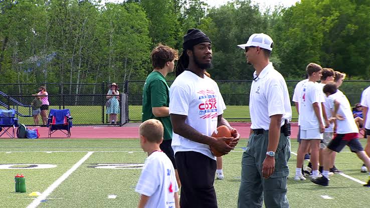 Buffalo Bills football star James Cook visits CNY youth football camp