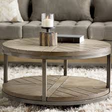 Featuring A Round Silhouette Caster Base And Contrasting Wood And Iron Design The Drossett Coff Coffee Table Farmhouse Coffee Table Coffee Table With Casters