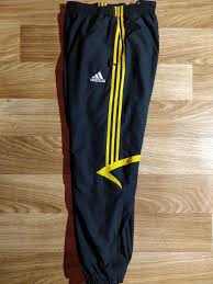 Black And Yellow Adidas Track Pants Check Out This Item In My Etsy Shop Https Www Etsy Com Listing 660044449 Adidas 90s Vintage Mens Tracksuit Pants Mens Tracksuit Pants Tracksuit Mens Outfits