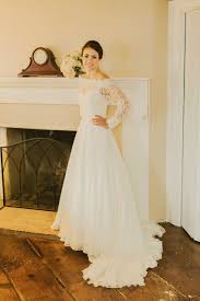 The Lacy Sleeves Of This Wedding Dress Is Pretty My Favorite Part Would Have To Be The Train It S Not Too Wedding Dress Alterations Dress Alterations Dresses