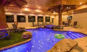 Gatlinburg chalets and cabins with indoor pools offer an exciting way to treat the entire family to a vacation in the great smoky mountains they wont soon forget. Eagle River Lodge Secluded Mountain Lodge W Huge Indoor Pool Views Pigeon Forge Indoor Pool Cabins In Gatlinburg Tn Gatlinburg Cabins