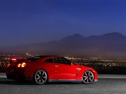 Desktop Wallpaper Of Nissan Gt R Skyline R35 Red Background Hd Nissan Gtr Gtr Nissan Gtr Wallpapers