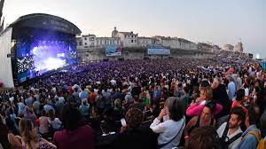 Spread throughout multiple venues in la rochelle, the historic seaport town in western france serves as an idyllic backdrop for the contemporary sounds coming from the stages. La Rochelle Reinvents The Francofolies Archyde