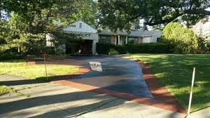 Our asphalt sealcoating & driveway sealcoating services in elgin,il include thorough cleaning of the entire asphalt surface and in cracks using a steel wired bristle broom to loosen up dried dirt and debris. Color Sealcoat Driveway In Deerfield Il Kaplan Pavement Services
