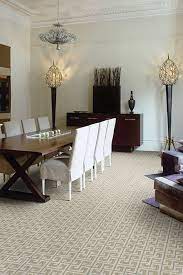 Rare is the arrangement that departs from a central table surrounded by chairs. Masland Carpets Rugs Olympia In Sterling Room View Modern Dining Room Carpet Dining Room Dining Room Rug