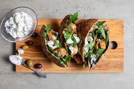 I've found cooking it on the stove is easier, however it results in a more chewy pita ingredients: Grilled Chicken Pita With Yogurt Sauce And Arugula Recipe Nyt Cooking