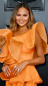 Chrissy teigen won the award for the most revealing dress at the american music awards on sunday. Chrissy Teigen Shares Thirst Trap Photo Of Herself And New Dog