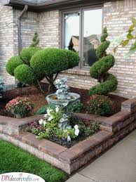When you look at each photo, imagine the front yards if they the spiral trimmed topiary standing right in front of the brick stone house has their own spotlight while the. Front Yard Landscaping Ideas On A Budget 25 Fantastic Ideas