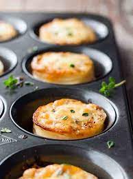 Cheesy Mini Potato Gratin Stacks Muffin Tin Recipe Cheesy Potato Gratin Potato Gratin Recipes