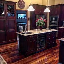 Black And Light Wood Kitchen Cabinets Dark Cabinets With Light Countertops Kitchen Island Tiger Wood Floors Beautiful Kitchen Ki Tigerwood Flooring Yellow Kitchen Walls Stained Kitchen Cabinets