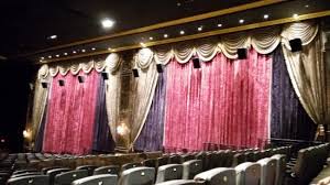 the pleasing drapes of a cine hall at palazzo picture of