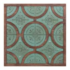 Quatrefoil iron wall plaque with hooks. Quatrefoil Wall Decor