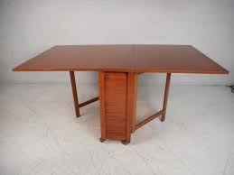Midcentury Drop Leaf Apartment Table On Casters With Hideaway Slat Wood Chairs In 2020 Apartment Table Wood Chair Table