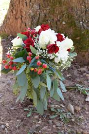 Balloon rose bouquet rose bouquet luminous yo cho artificial red rose flower bouquets 7 head silk hydrangea christmas decor flowers a wide variety of rose hydrangea bouquets options are available to you, such as wedding, valentine's day. Winter Wedding Bouquet Filled With Red Roses White Roses White Hydrangea Hypericum Berries Babies Red Bouquet Wedding Rose Wedding Bouquet Wedding Bouquets