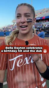 Texas' Bella Dayton celebrates a hit and a #WCWS win
