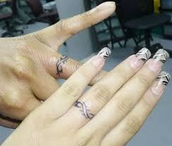 View this post on instagram. 9 Wedding Ring Tattoos Ideas Designs For Men And Women