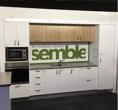 We supply a complete range of flat packed kitchen cupboards manufactured in australia from quality australian panels. Check Out Sembleau Brand New Display Australian Made Flat Pack Kitchens At The Best Price Using Your Reno Car Flatpack Kitchen Kitchen Kitchen Utensils Store