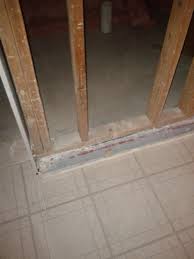 Can you please advise on the current load bearing beam and posts are likely supporting beams and posts on the floors above. Interior Load Bearing Wall Has Concrete Block Sticking Out From Floor Doityourself Com Community Forums
