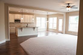 Read on to learn more about the pros and cons of popular kitchen flooring materials. The Living Room And Kitchen Of The Westmont Ii Floor Plan By Ball Homes For The Home Living Room Wood Floor Wood Floor Kitchen Und Open Kitchen Living R