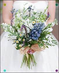 Above, lavender is front and center in this large bridal bouquet. A Wildflower Bouquet Blue Wedding Bouquet Wedding Flowers Wildflowers Flower Bouquet Wedding