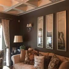 Deep blacks complement warm whites with gold accents to create a. The Top 59 Brown Living Room Ideas