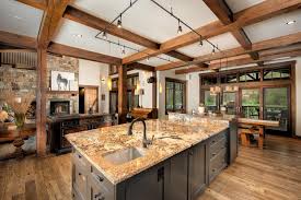 dark brown kitchen island with stone