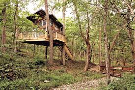 The pine ridge home, a 2 bedroom home on 4 private acres with a hot tub! Tree House Rental Glamping In Missouri