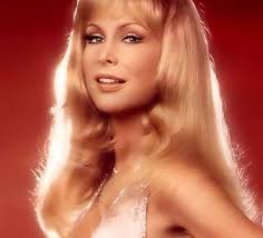 Actress Barbara Eden models a Bob Mackie gown, 1969.