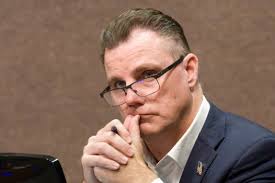 Michael Gates, former Huntington Beach city attorney, was fired from the  Justice Department 'for cause'