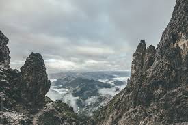 Overcast Landscape With Harsh Rockformation In The Austrian Alps By Akela From Alp To Alp Stocksy United