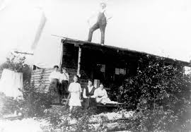 Robert Seeds and family in front of their home