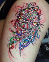Watercolor dreamcatcher tattoo designs @no_tilusse_tattoo on instagram. Colorful Watercolor Dreamcatcher Tattoo On Thigh