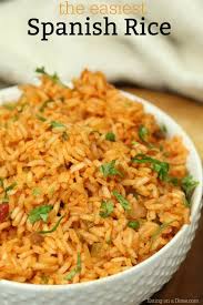 Add garlic and rice, stirring frequently until rice is lightly browned. Easy Spanish Rice Recipe Homemade Mexican Rice Recipe