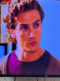 Emily the Strange aims her slingshot at Salvador Mendoza.