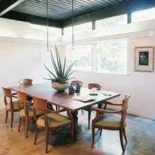 If you want a modern dining table centerpiece, there isn't a thing better than using fake or artificial flower arrangement to lend a classic touch to your dining space. Centerpieces Midcentury Dining Photos Houzz