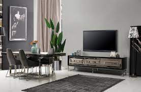 This spacious living room has plain gray walls with a white ceiling and window panels. Casa Padrino Luxury Dining Room Set Black Gray Silver 1 Dining Table 6 Dining Chairs Luxury Dining Room Furniture